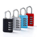 Four combination padlocks in a row, colored black, silver, blue, and red, each with three dials set to "7-8".