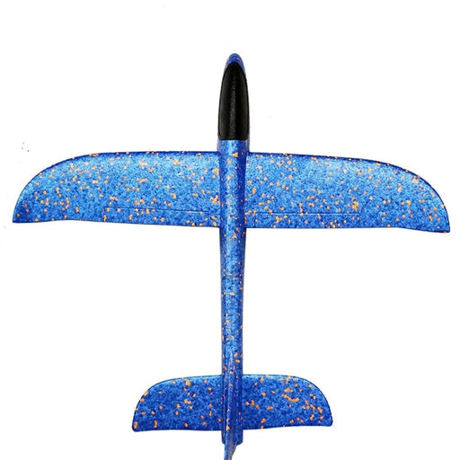 a top-down view of the fully assembled blue foam glider with orange speckles, emphasizing its simple yet effective design.