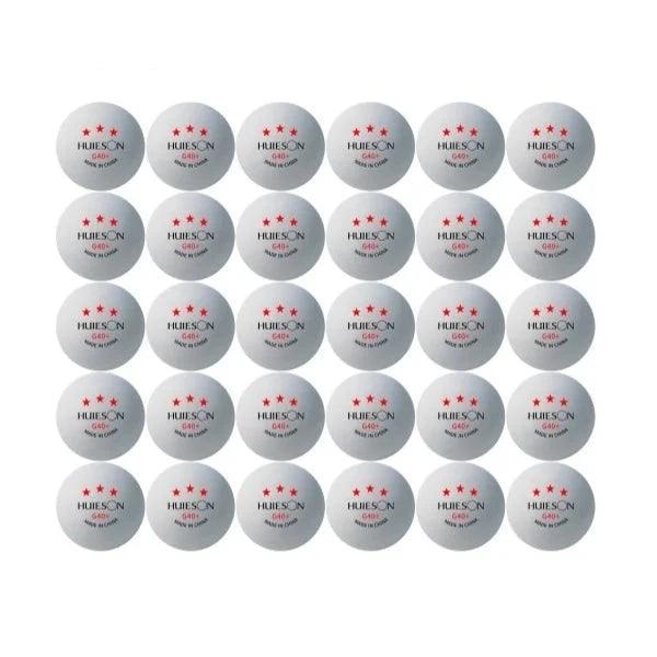 Thirty white Huieson G40+ table tennis balls arranged in a grid, each with three red stars and "Made in China" text.