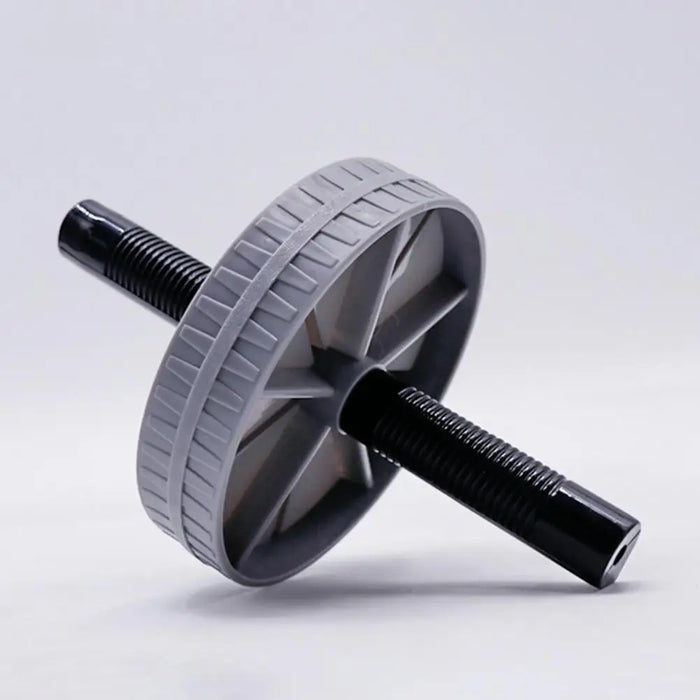 Side view of a grey ab roller wheel showing the black grip handles on both ends of the central metal rod.