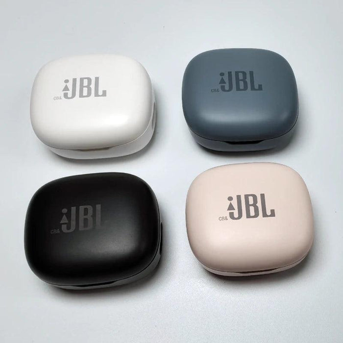 Four closed JBL charging cases in black, white, blue, and pink.