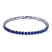 Silver tennis bracelet with blue stones on a white background.