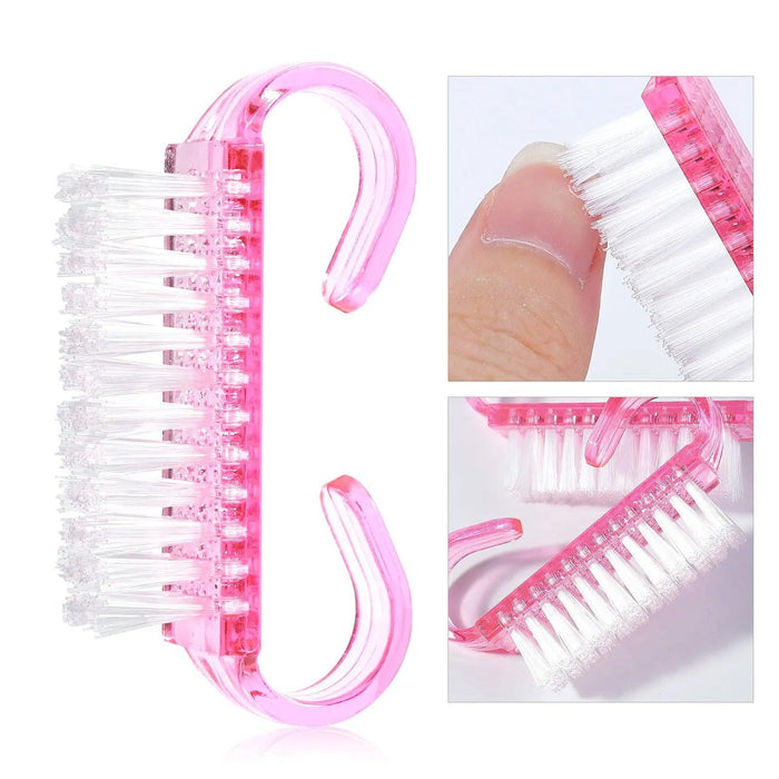 a pink nail brush with white bristles. The brush has a double-ended design with hooks on each end. Inset images highlight the brush in use, demonstrating its effectiveness for cleaning nails and detailing its bristle arrangement.