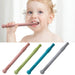 A toddler with light hair is shown chewing on a pink silicone teething stick. Below are four silicone teething sticks in pink, green, blue, and gray.