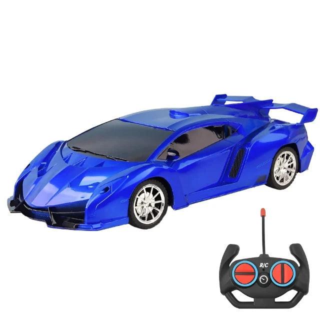 A blue sports car with black accents and an accompanying remote control. The car has a sleek, angular design and a large rear spoiler.