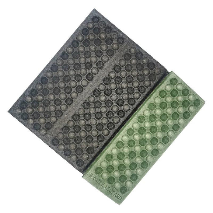 Black and army green Foldable Foam Mats: Two foldable foam mats, one in black and the other in blue, placed side by side, both featuring a textured surface with a pattern of raised dots for cushioning and support.