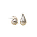 a pair of silver teardrop-shaped earrings. The earrings have a smooth, polished surface and are placed against a white background, showcasing their sleek and modern design.