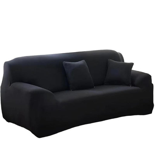 Black sofa covered with a fitted cover and two matching black pillows.