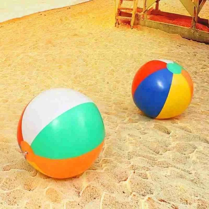 Two Colorful Beach Inflatable Balls displayed on sand.