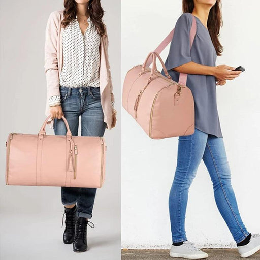 Two women showcasing a light pink duffle bag, one carrying it by hand and the other wearing it over her shoulder.