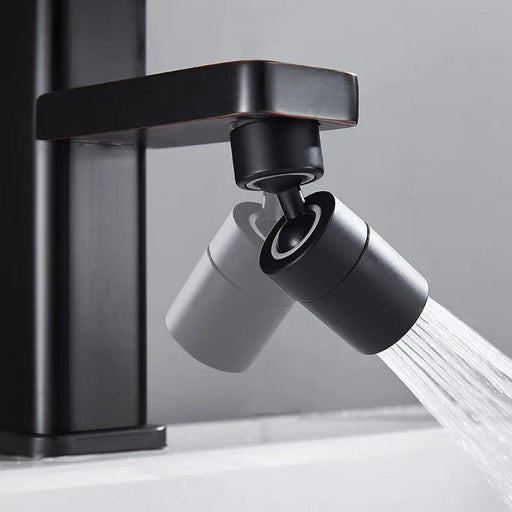 A black faucet attachment connected to a modern faucet, demonstrating the rotation and dual water flow modes.