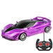 A sleek, purple sports car with black accents and an accompanying remote control.