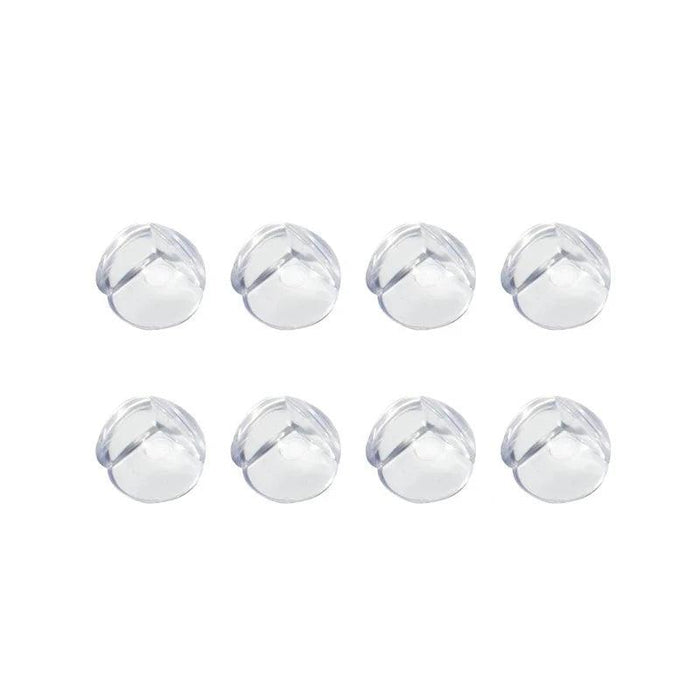 Set of eight transparent corner protectors display on white background.