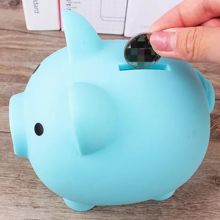 blue Piggy Bank inserted a coin