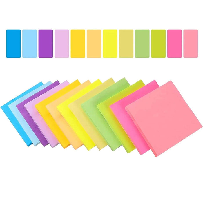 Colorful stacks of adhesive note pads arranged in a layered formation, showcasing a spectrum of colors on a white background.