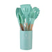  A set of turquoise silicone kitchen utensils in a matching holder.