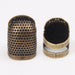 Back and front view of Two vintage Sewing Thimbles.