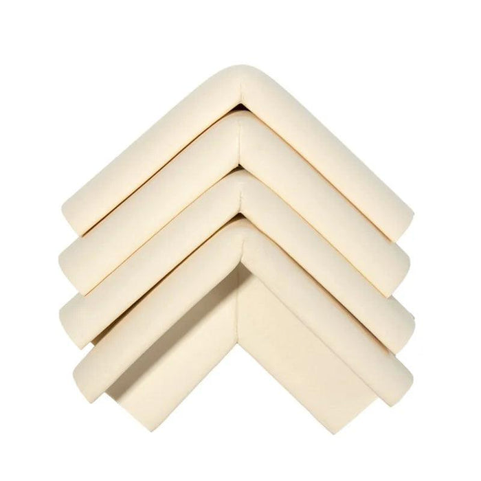 Four cream corner protectors display on white background.