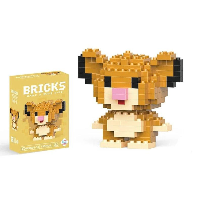 A single block-style toy figure of yellow lion puppy, along with its yellow packaging box. Display on white background.