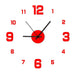 A wall clock with red numbers and black hands, featuring a red center circle, displayed on a white background.