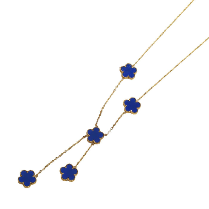 A gold neckalce, designed with a flower-shaped pendant with a blue center.