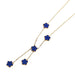 A gold neckalce, designed with a flower-shaped pendant with a blue center.