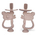 Two beige silicone teethers shaped like koalas with built-in toothbrush bristles on top.