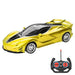 A sleek, yellow sports car with black accents and an accompanying remote control.