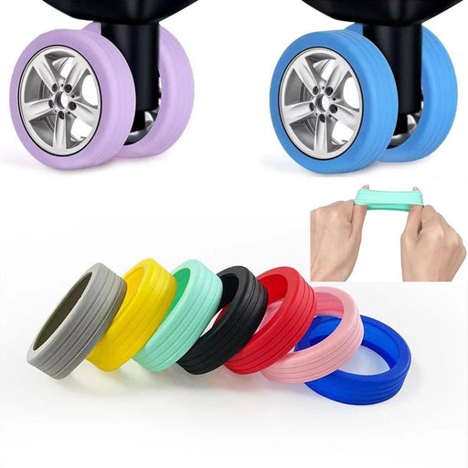 Close-up of purple and blue silicone wheel covers on suitcase wheels, showing the snug fit and vibrant colors.