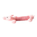 A plush pink pig dog toy with a red and white striped body.