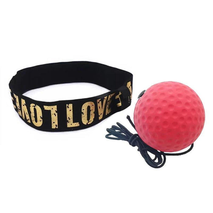 A red boxing reflex ball attached to a black headband, showcasing its design and setup.