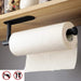 Black under-shelf paper towel holder with a no-drill installation method, supporting a large paper towel roll.