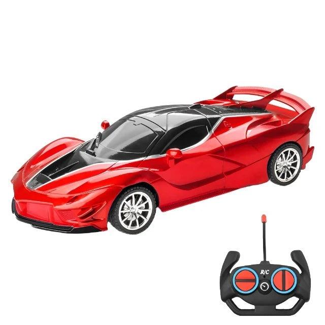 A sleek, red sports car with black accents and an accompanying remote control.