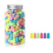 A jar filled with Mixed-color earplugs. With 6 colorful earplugs beside it.