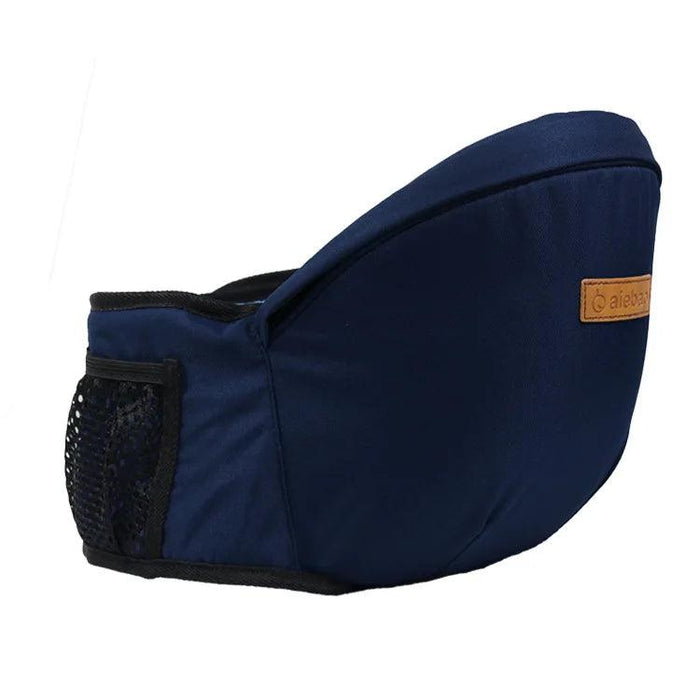 A navy blue baby waist carrier with a black mesh pocket, featuring a brown label tag for a stylish and functional baby carrying solution.