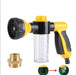 A yellow hose nozzle with a clear soap dispenser attached, along with a shower adapter fitting shown separately.