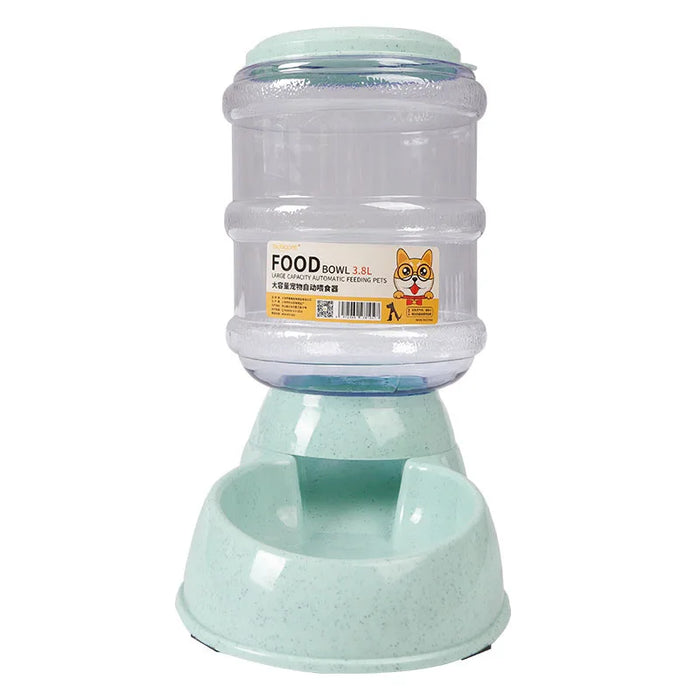 An automatic pet food dispenser with a large clear food container labeled "FOOD Bowl 3.8L". The container is mounted on a light green base that has a built-in food bowl.