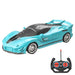 A sleek, light blue sports car with black accents and an accompanying remote control.