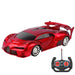  A shiny red sports car with black accents and an accompanying remote control. The car features a sleek, aerodynamic design and large rear spoiler.