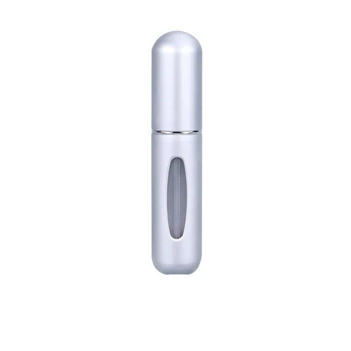 A silver-colored portable perfume spray bottle with a transparent window to view the contents.