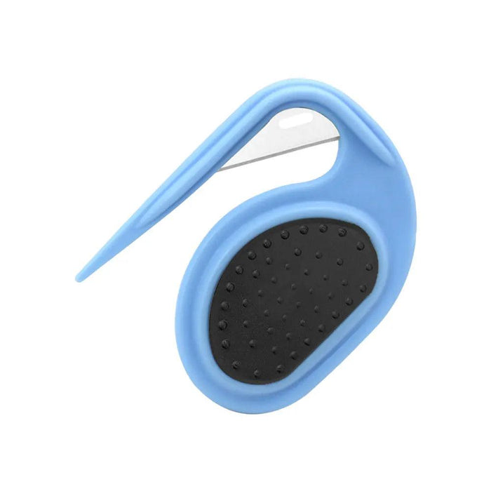 A close-up of the blue pet grooming tool, highlighting its design and black grip area.