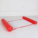 Inflatable red pool float with white mesh laid out on the floor.