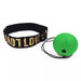 A green boxing reflex ball attached to a black headband, showcasing its design and setup.