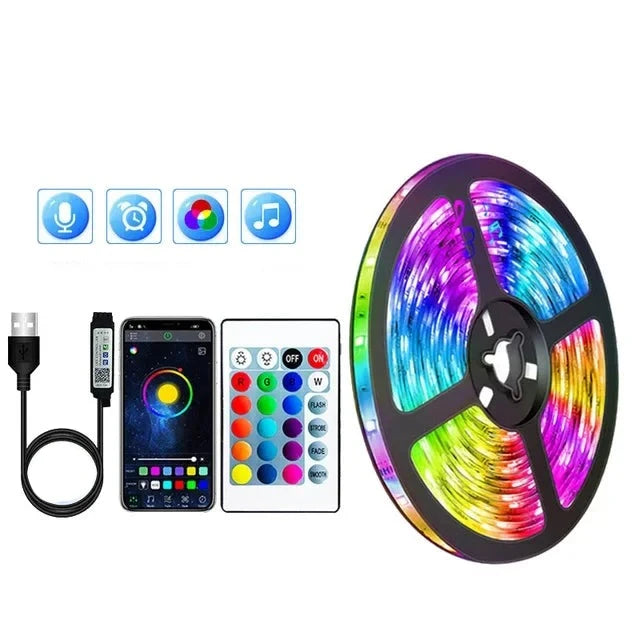 A roll of LED strip lights with multiple color options, a remote control, a USB cable, and a smartphone displaying a control app. The setup suggests various modes and features such as music sync and color customization.