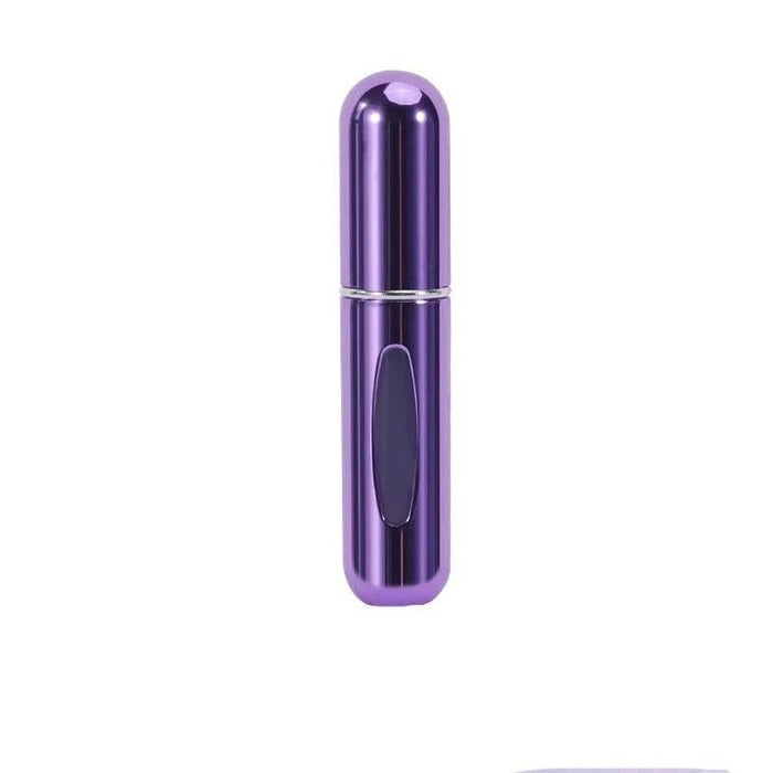 A metallic dark purple portable perfume spray bottle with a transparent window.