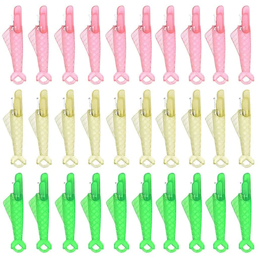 Thirty Fish Mouth Sewing Machine Needle Threaders in green yellow and pink.