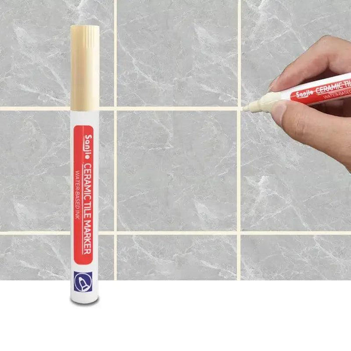 A beige ceramic tile marker in use on a marble-like tile surface, clearly defining grout lines for a polished and clean finish.