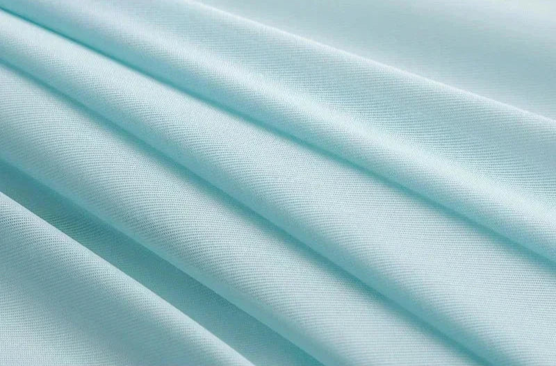 Close-up of the light blue fabric texture.
