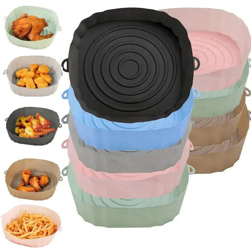 A stack of various colored silicone air fryer liners (black, blue, beige, gray, mint green, pink) with individual liners containing different food items like fried chicken, nuggets, and french fries.