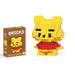 A single block-style toy figure of yellow bear, along with its brown packaging box. Display on white background.